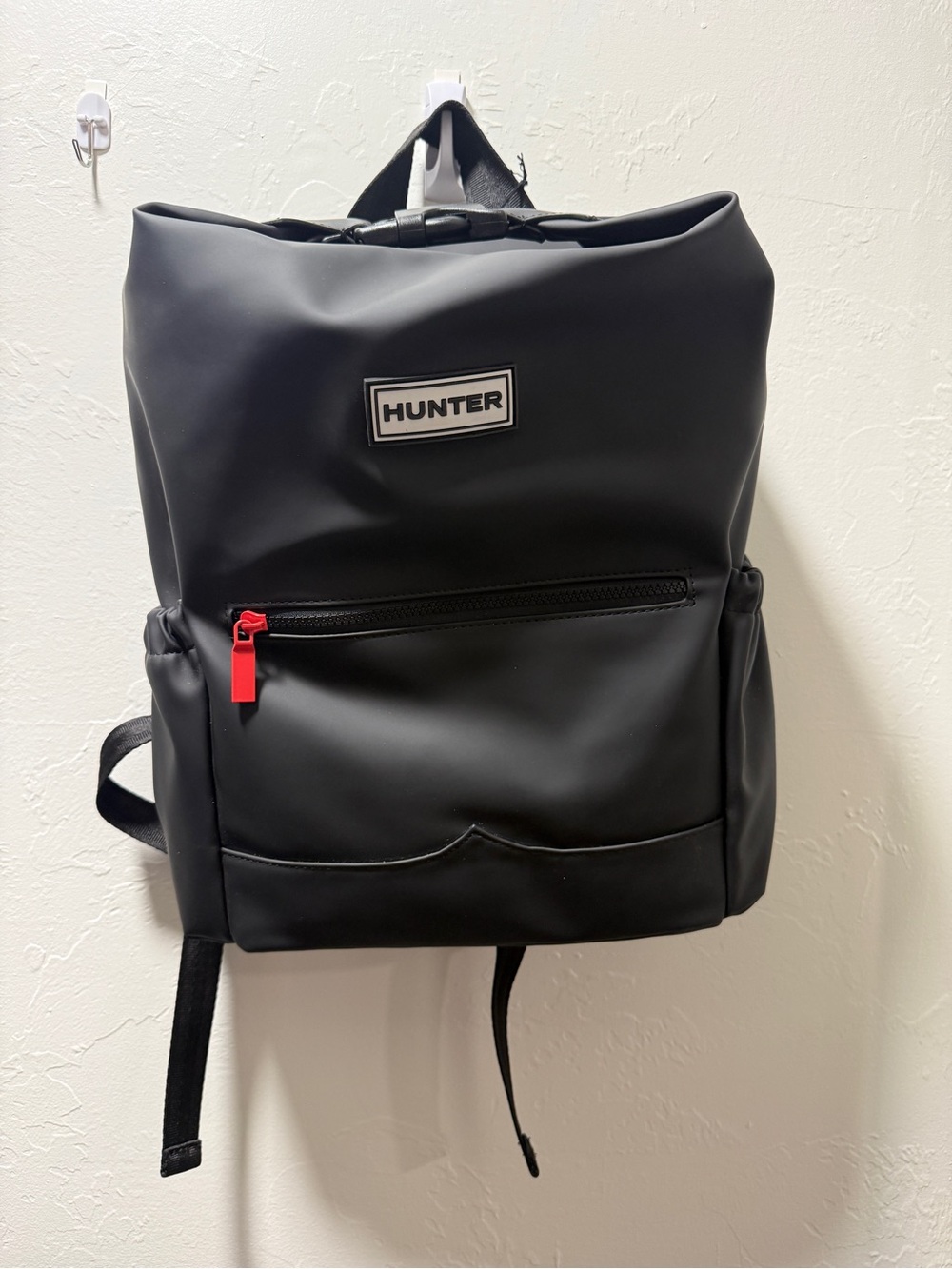 Hunter Black Backpack with Red Zip Pull